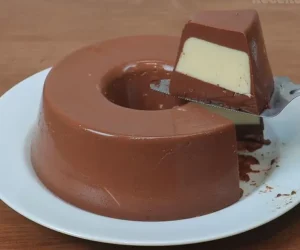 8_8M-views-·-15K-reactions-_-Todo-Mundo-vai-Pedir-Pudim-de-Leite-Ninho-com-Chocolate-_-Todo-Mundo-vai-Pedir-Pudim-de-Leite-Ninho-com-Chocolate-_-By-Nossa-Receita-_-Facebook